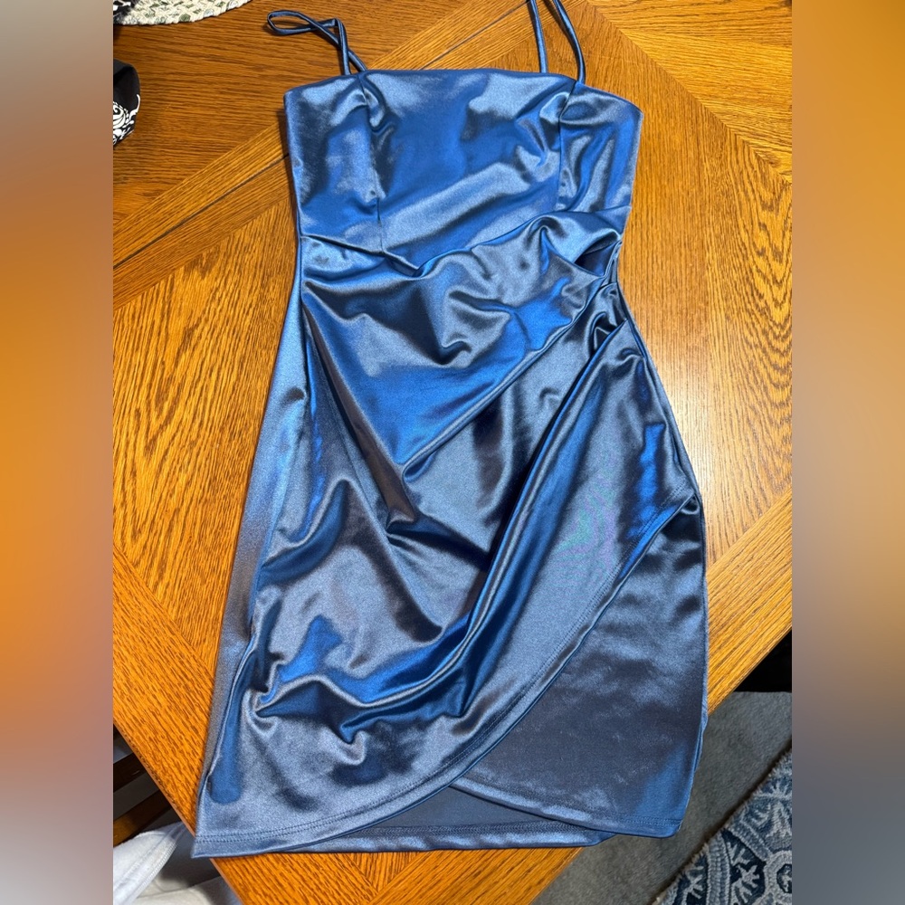 Formal homecoming dress. Size 4. Small dark spot on rear of dress